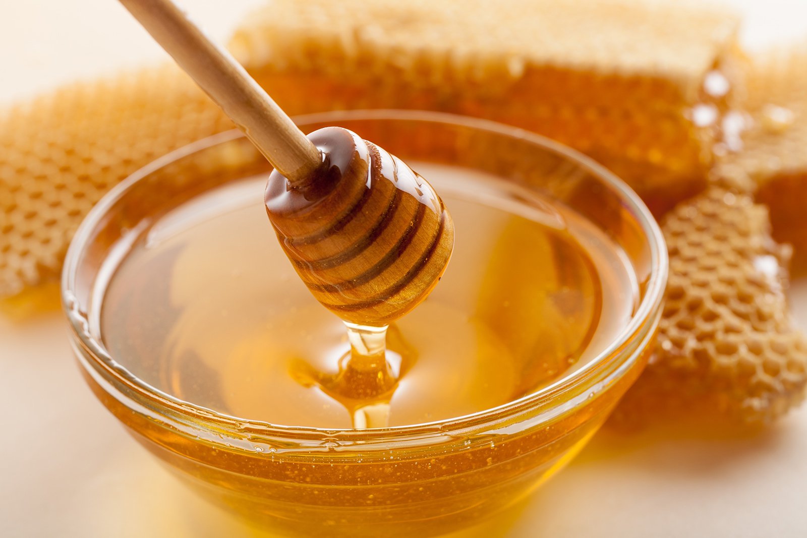 Thick and Pure Honey Kept In A Bowl