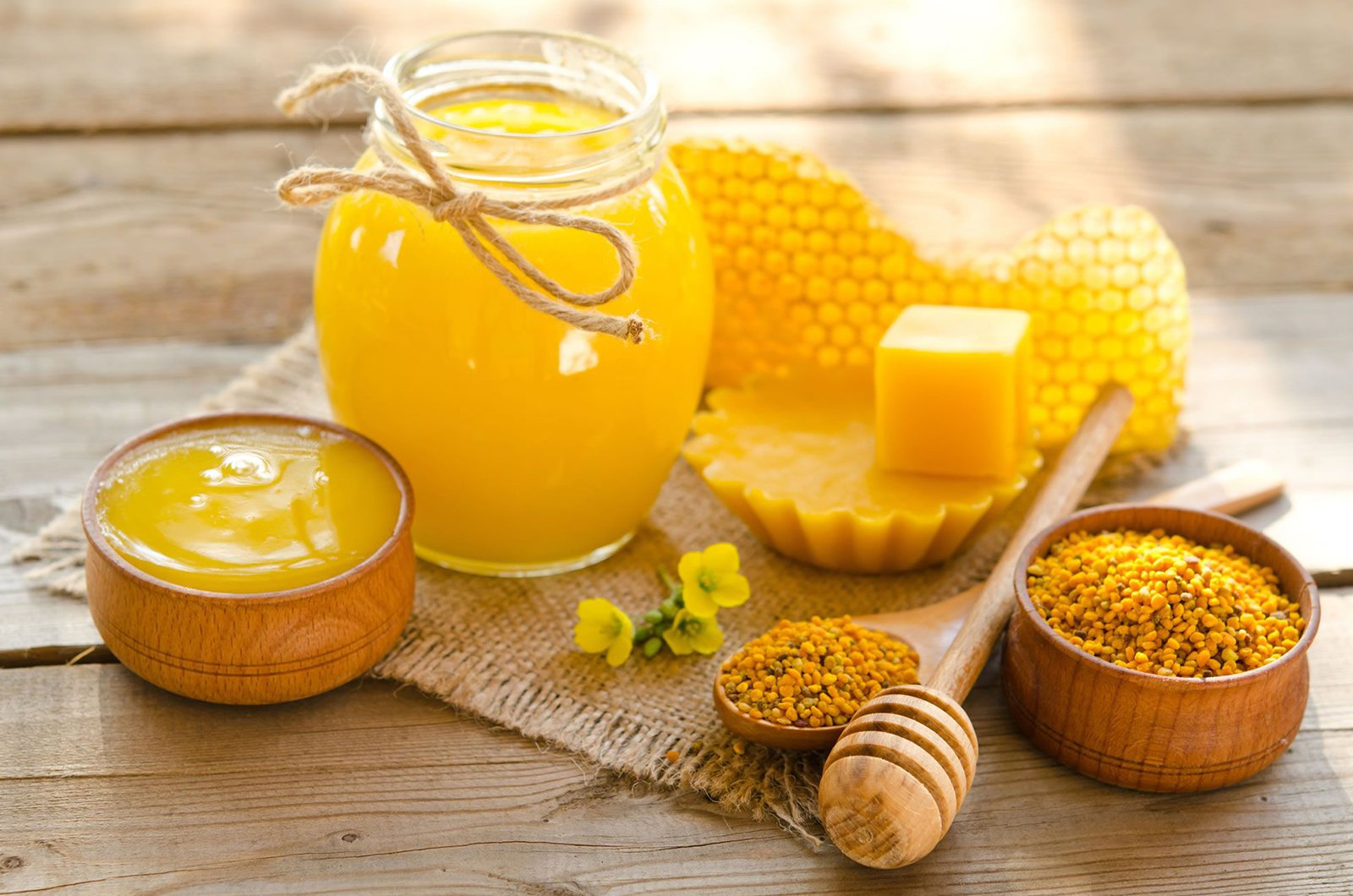 Thick and Golden Pure Honey In A Jar and Bowl