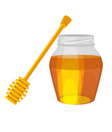 A jar of honey and a wooden spoon.